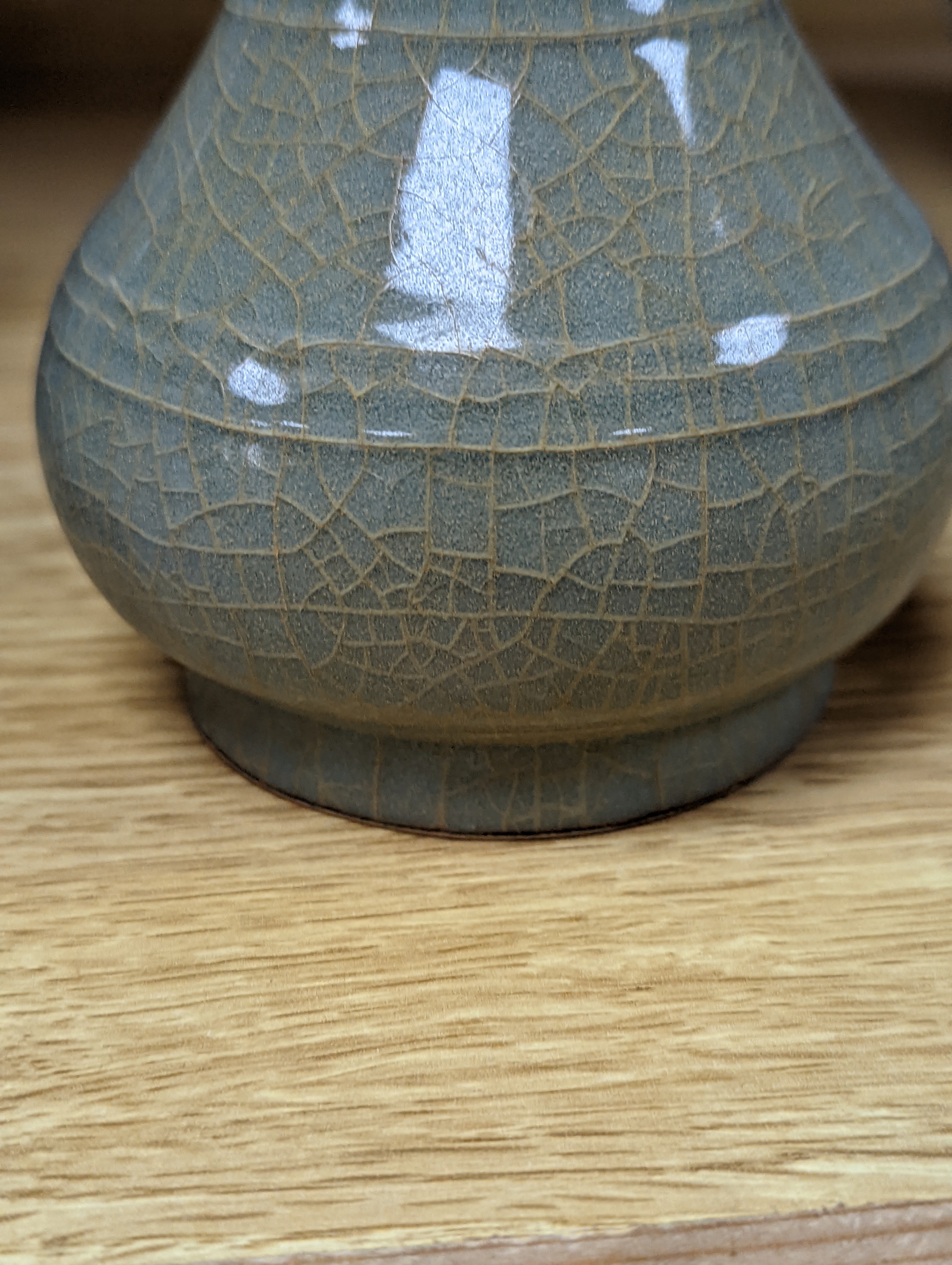 A Chinese celadon bottle vase 15.5cm